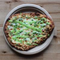 Tacoma Pizza · Olive oil, roasted garlic, hummus, mozzarella, peas, wasabi sauce