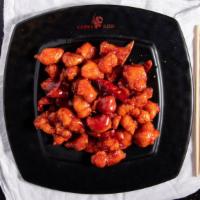 Orange Chicken · Chicken dipped in batter and deep fried until crunchy blended into a special orange peel sau...