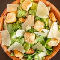 Caesar Salad · Romaine lettuce, fresh Parmesan cheese, Caesar dressing.