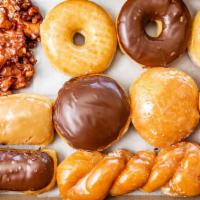 Special Assorted Mix · (1 apple fritter or cinnamon roll or scone or maple bar bacon, 2 bars, 1 twist, 1 filled, 3 ...