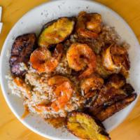 Jerk Shrimp · Grilled shrimp season with Jamaican Jerk Dry rub over rice with sauce drizzled on top
