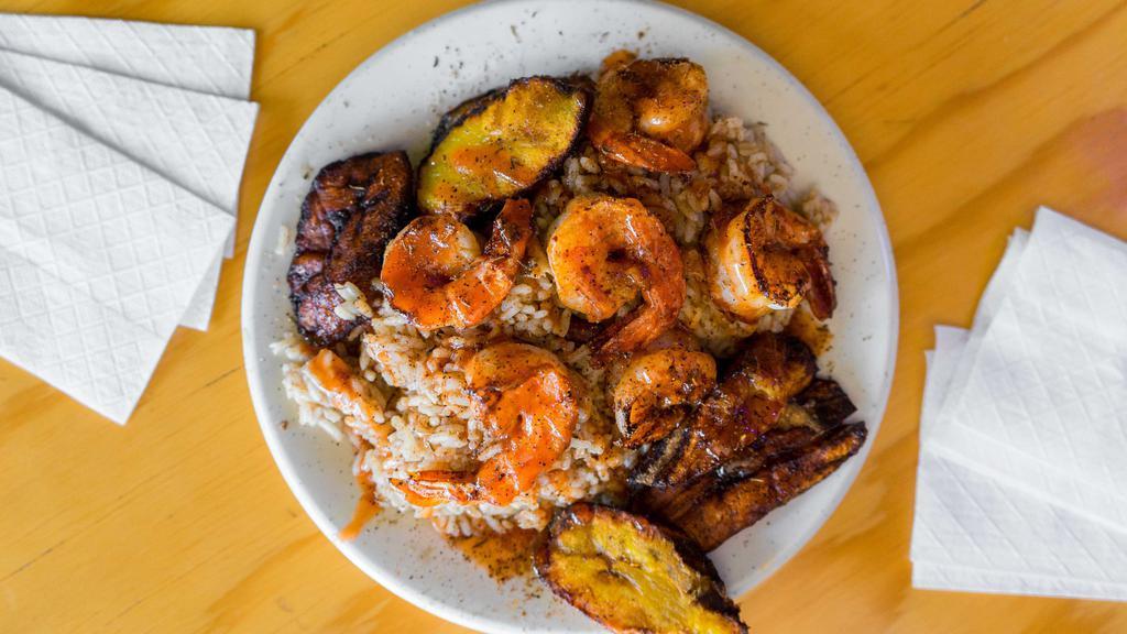 Jerk Shrimp · Grilled shrimp season with Jamaican Jerk Dry rub over rice with sauce drizzled on top