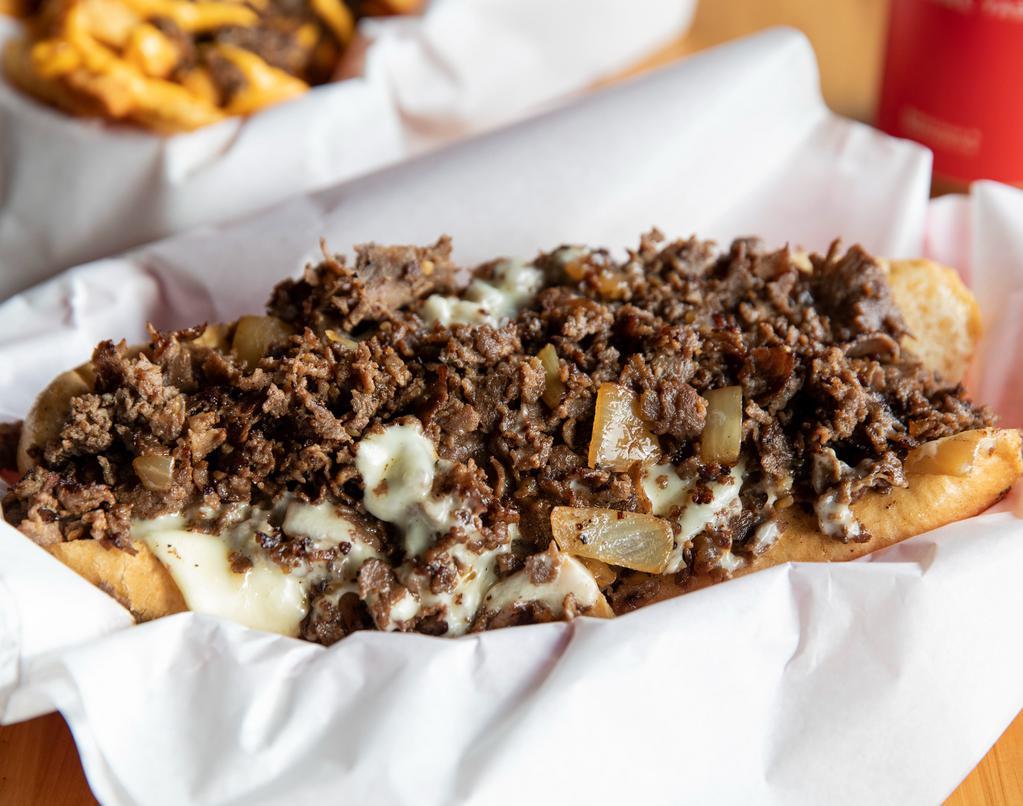 Original Philly · 8 oz Shaved Seasoned Steak, Grilled Onion, White American Cheese and Mayo