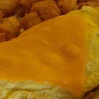 Denver Omelet · Ham, onions, bell peppers. Topped with Cheddar cheese.