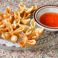 Crab Delight · Crab meat and cream cheese wrapped in fried wonton
