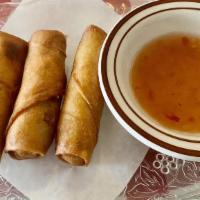 Spring Rolls · Deep fried, stuffed with cabbage, carrots, and silver noodles; served with plum sauce.