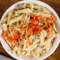 *New* Cajun Chicken Alfredo · Spicy grilled chicken and mushrooms, tossed in cajun alfredo sauce and topped with  Parmesan...