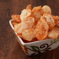 Potato Chips · Made fresh when ordered.  Get them salted or a touch of spice with cajun seasoning.