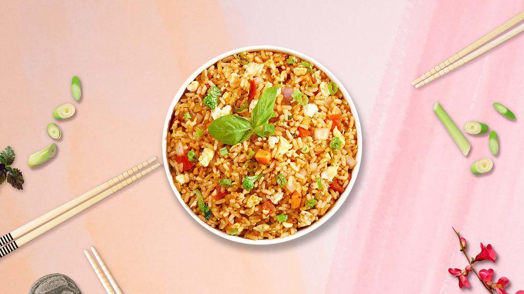 Curry Fried Rice · Stir-fried rice served with celery, carrot, onion, and yellow curry. No coconut milk.