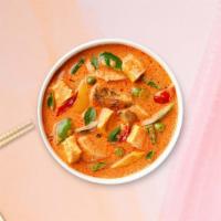 Pumpkin Curry · Coconut milk, red curry with Japanese pumpkin, bell peppers, and chocie of protein.