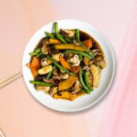 Ginger Thai Style · Thai sliced ginger root with carrot, onion, bell pepper, and shiitake mushrooms.