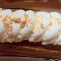 Key Lime Eclair · Filled with a tangy and creamy key lime infused pastry cream and topped with homemade whippe...
