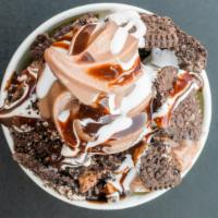 Cookie Monster · Oreo cookie crumble frozen yogurt.  Topped with Oreo cookies with chocolate sauce and mallow...