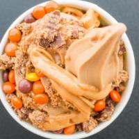 Peanut Butter Lovers Dream · Peanut butter frozen yogurt.  Topped with chopped Reeses and Reeses Pieces.  Peanut Butter s...