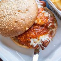 Chicken Parmigiana Sandwich · Chicken  cutlet + tomato herb sauce + mozzarella + parmigiao + sesame encusted sicilian bagu...