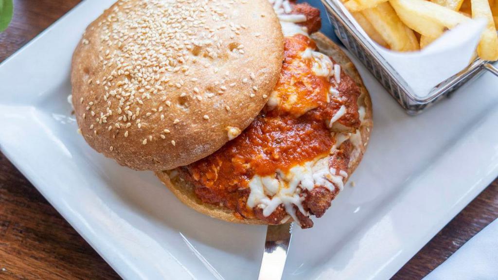 Chicken Parmigiana Sandwich · Chicken  cutlet + tomato herb sauce + mozzarella + parmigiao + sesame encusted sicilian baguette