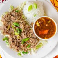 Small Kalua Pulled Pork · Slow cooked and smokey shredded pork with cabbage.