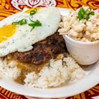 Loco Moco · Half-pound house-made patty served atop a bed of rice with two eggs, drenched in housed-made...