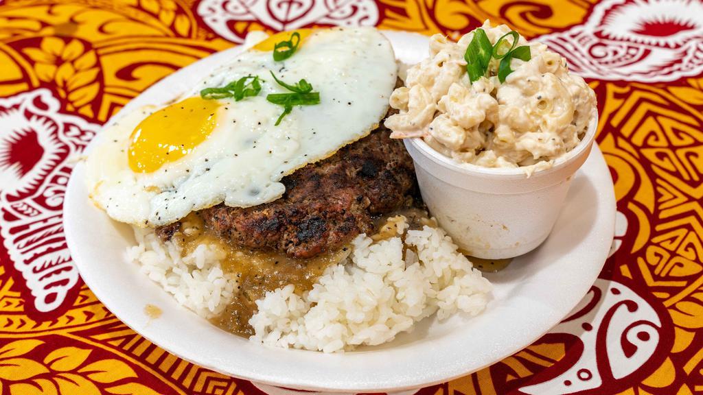 Loco Moco · Half-pound house-made patty served atop a bed of rice with two eggs, drenched in housed-made brown gravy.