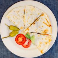 Quesadilla · Grilled tortillas stuffed with mozzarella, and cheddar cheese served with sour cream and sal...