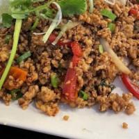 Holy Chicken · Spicy. Stir fried ground chicken or in crushed thai pepper and garlic oil with onions, mushr...