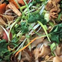 Pad Thai · Pan-fried rice noodles with bean sprouts, eggs, green onions, sliced of cabbage, carrots, gr...