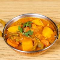 Veggie Curry · Mixed vegetable with traditional curry sauce.