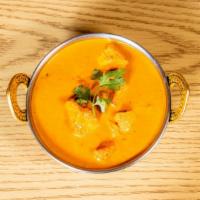 Chicken Tikka Masala · Tender boneless chicken pieces broiled in the tandoor and cooked with tomato, onion and crea...