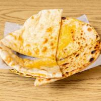 Cheese Naan · Freshly baked naan with cheese.
