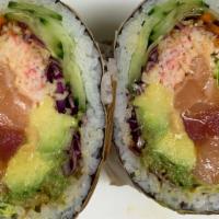 Fire Dragon Burrito · Spicy tuna and salmon, avocado, carrot, cucumber, purple cabbage, romaine hearts, imitation ...