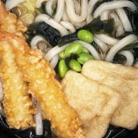 Soup Udon · Kombu dashi soup with tsuyu sauce, tempura shrimp, seaweed, fried bean curd, edamame and veg...