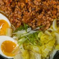 Dandan Mian · Spicy soup with ground pork, mushroom, soft boiled egg and veggies.