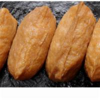 Inari · Soybean curd pouch with rice. 4 pcs