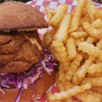 Fried Chicken Sandwich With Crinkle Fries · Pickle brined fried chicken with slaw, pickles, and housemade lime aioli on a toasted rosema...
