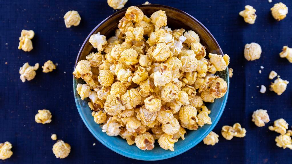 New Mexico Sunset · Popcorn, corn/butter oil, cheddar cheese mix (cheddar cheese powder, buttermilk, spices, salt), freshly roasted NM Green and Red Chile, spices, salt.