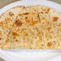 Quesadillas · FLOUR TORTILLA CHEESE LETTUCE AND PICO DE GALLO