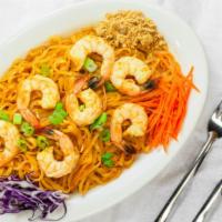 Pad Thai · Thin rice noodles in house golden Thai sauce, egg, bean sprouts, green onion and garnished w...