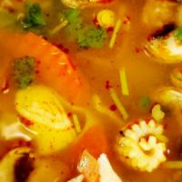 Thai Hot & Sour Soup (Seafood Combo Soup) · Salmon, shrimp, mussels, squid, scallops, imitation Crabmeat, squid, Napa Cabbage, Kaffir li...