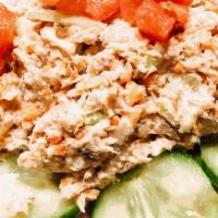 Albacore Tuna Salad · Mixed greens, tomatoes, cucumbers & our homemade tuna salad served with balsamic basil vinai...