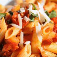 Traditional Tomato Basil · Penne with fresh tomatoes, basil, garlic & extra virgin olive oil topped with parmesan cheese