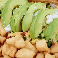 The Favorite · Three eggs scrambled with goat cheese, sundried tomatoes, avocado, mushrooms & basil, served...