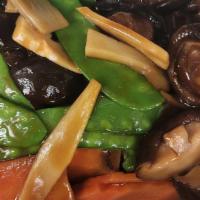Mushroom Duck · Sauteed oven-roasted duck with mushrooms, bamboo, snow peas, and water chestnuts in a brown ...