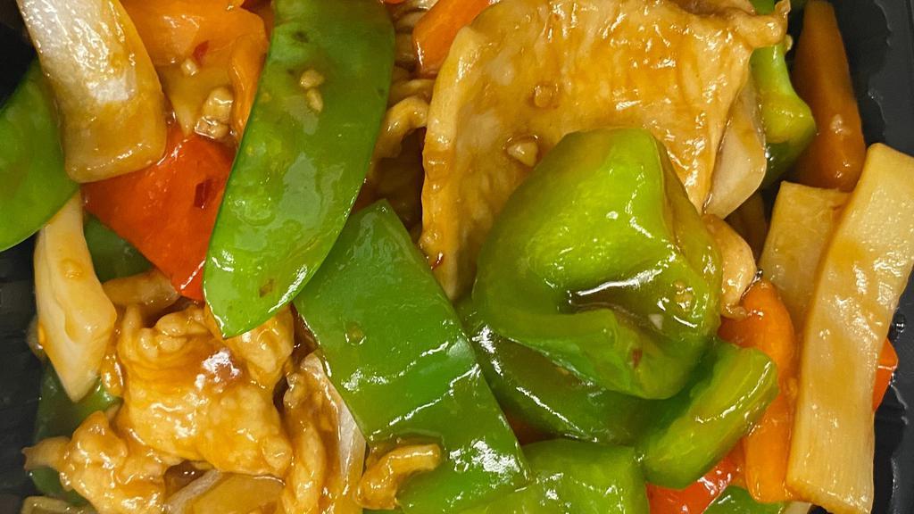 Szechuan Chicken · Stir-fried white meat chicken with bell peppers, bamboo, carrots, and mushrooms in a spicy brown sauce.