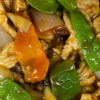 Garlic Chicken · Stir-fried white meat chicken with bell peppers, bamboo, carrots, and mushrooms in a spicy a...