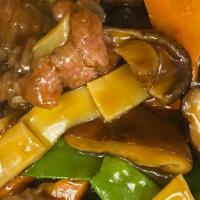 Beef & Black Mushroom · Stir-fried beef with mushrooms, bamboo, snow peas in a brown sauce.