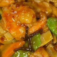 Garlic Seafood · Stir-fried with bell peppers, bamboo, carrots, and mushrooms in a spicy and sweet garlic sau...