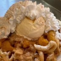 Peach Cobbler · Our special in-house Peach Cobbler warmed and served over a powder sugar funnel cake with a ...