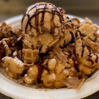 Crazy Caramel Chocolate  Crunch · Hershey's caramel & chocolate syrup drizzled over a powder sugar funnel cake with waffle con...