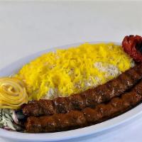 Koobideh Kabob · Two skewers of our marinated ground beef, grilled on a skewer, served with grilled tomato an...