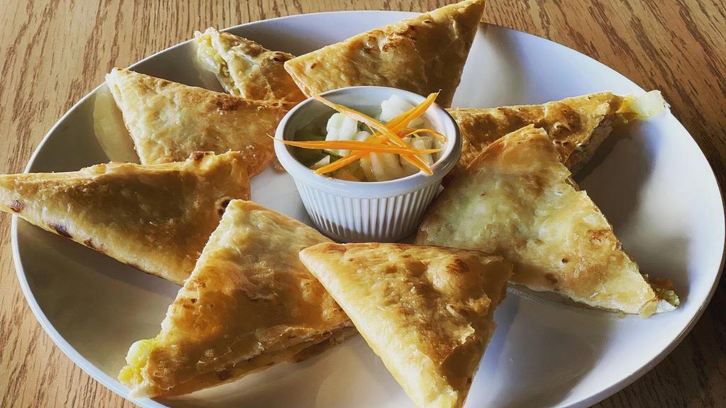 A15 Thai Samosa 8 Pcs. · Crispy wrapped mix of potato, onion and curry, served with sweet & sour sauce.